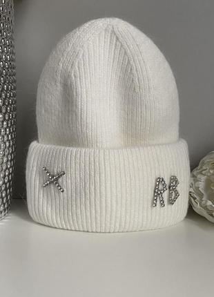 Шапка зимняя теплая руслан багинский, белая шапка, вязаная шапка известного бренда1 фото