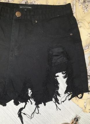 Короткі джинсові шорти з бахромою з рваностями3 фото