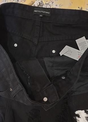 Короткі джинсові шорти з бахромою з рваностями4 фото
