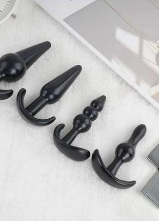 Профессиональный набор анальных пробок (4 шт.): максимум удовольствия с разнообразием форм.