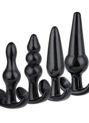 Профессиональный набор анальных пробок (4 шт.): максимум удовольствия с разнообразием форм.