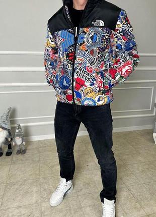 Куртки tnf