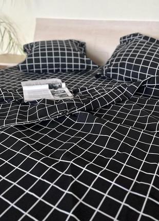 Комплект постільної білизни у клітинку
