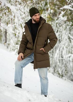 Зимова подовжена чоловіча куртка10 фото