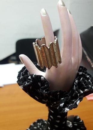 Кольцо перья