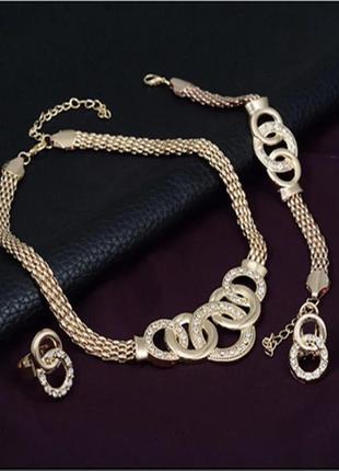 Комплект бижутерии: ожерелье, серьги, кольца, браслет1 фото
