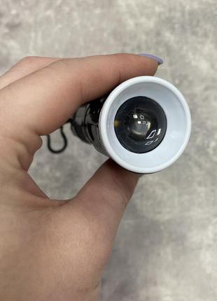 Ліхтарик ручний на батарейках із фокусуванням чорний маленький-кишеньковий sooya sy3062 фото