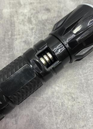 Ліхтарик ручний на батарейках із фокусуванням чорний маленький-кишеньковий sooya sy3063 фото