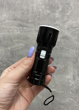 Ліхтарик ручний на батарейках із фокусуванням чорний маленький-кишеньковий sooya sy3064 фото