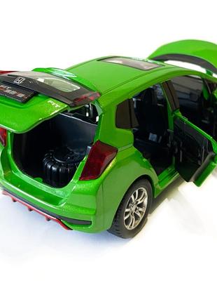 Машинка металева дитяча honda fit, зелена, металева, 1:32, звук, світло, інерція, відкриваються двері, багажник, капот, 15*5*6см7 фото