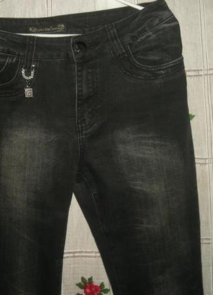 Супер джинсы"kaiweishi"р.31,черного цвета с потертостями4 фото