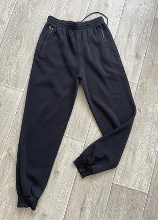 Теплі спортивні штани на манжеті 44 чоловічі теплі однотонні брюки на резинці фліс весна зима8 фото