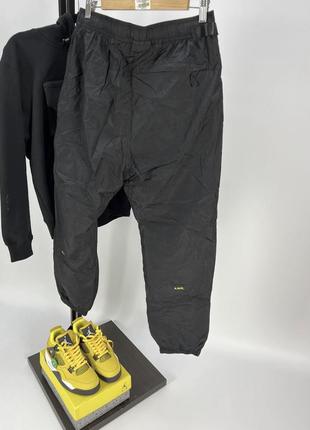 Штани нейлонові nike x drake nocta pants drill8 фото