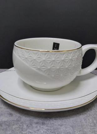 Чашка з блюдцем 240 мл порцелянова біла снігова королева interos 508610-a1 фото