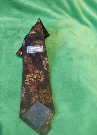 Gianni versace vintage

краватка.2 фото