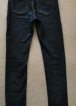 Завужені джинси скінні на високій посадці обтягуючі вузькі урокоченные джинси жіночі темно-сині5 фото