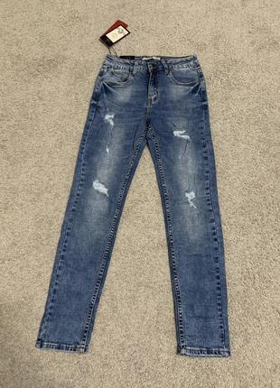 Женские джинсы американки зауженные с дирками avie 25-309 фото