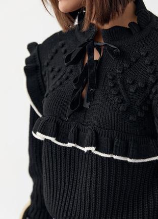 Вязаный черный свитер с завязками7 фото