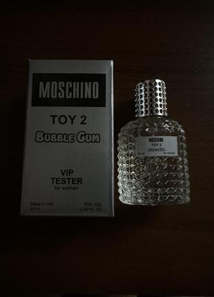 Женский тестер moschino toy 2 bubble gum 60ml(москино бабл гам ) оаэ 60 мл2 фото