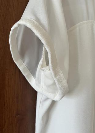 Блуза белого цвета с коротким рукавом3 фото