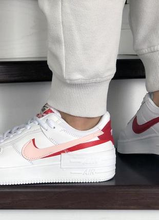 Милые женские кроссовки nike air force 1 белые с красными полосками2 фото