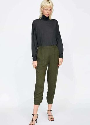Зеленые укороченные брюки zara z1975(размер 36-38)