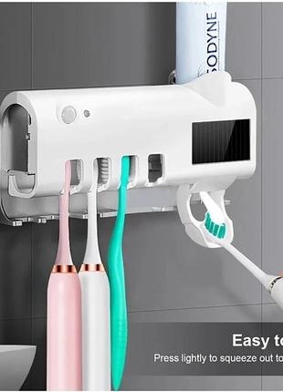 Стерилізатор тримач для зубних щіток на 4 секції з дозатором multi-function toothbrush sterilizer uv2 фото
