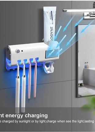 Стерилізатор тримач для зубних щіток на 4 секції з дозатором multi-function toothbrush sterilizer uv3 фото