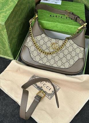 Очень красивая коричневая классическая сумка от gucci9 фото