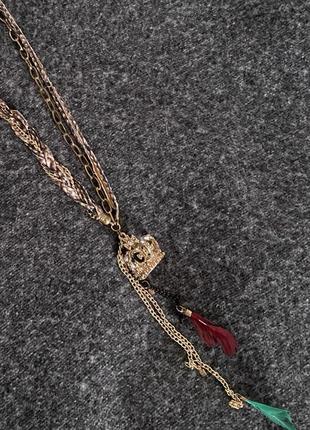 Украшение короны с перьями на длинной цепочке