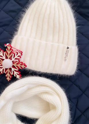 Теплая зимняя ангоровая шапка на флисе1 фото