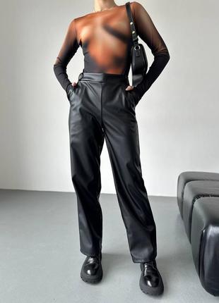 Штани жіночі чорні з еко-шкіри на флісі теплі1 фото