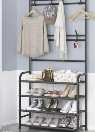 Універсальна вішалка для одягу new simple floor clothes rack size 60x29.5x151 см чорна3 фото