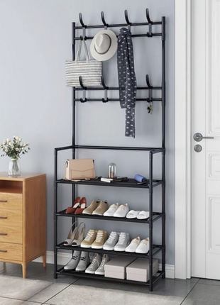 Універсальна вішалка для одягу new simple floor clothes rack size 60x29.5x151 см чорна4 фото