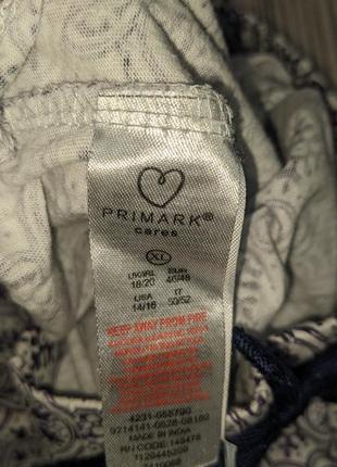 Белые трикотажные штаны в фиолетовый принт для сна и дома primark #32096 фото