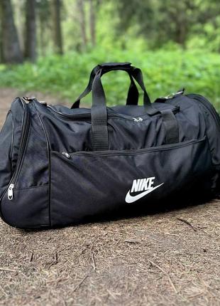 Спортивна дорожня чорна сумка nike4 фото