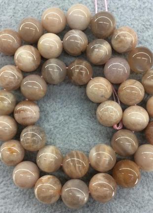 Настены на нитке натуральный природный солнечный камень гладкий шарик d=10мм