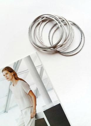 Набор из девяти серебристых браслетов accessorize