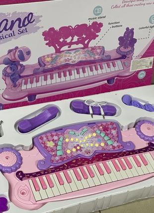 Детское пианино синтезатор и микрофоном 8 инструментов, 4 мелодии, функция записи розовый для девочки 6619