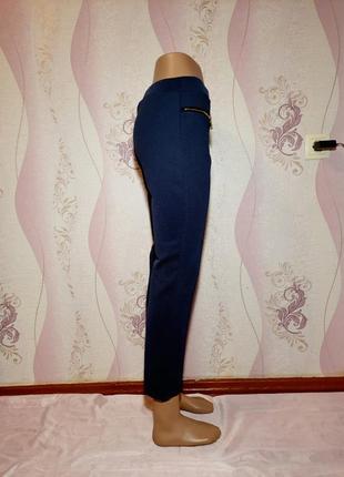 Темно синие стрейчевые брюки2 фото