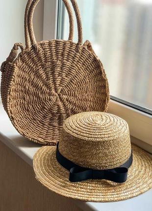 Комплект соломенная шляпка женская канотье и сумочка плетёная из рафии круглая1 фото