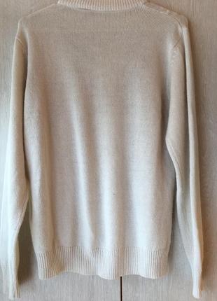 Вовняний светр з вишивкою.2 фото