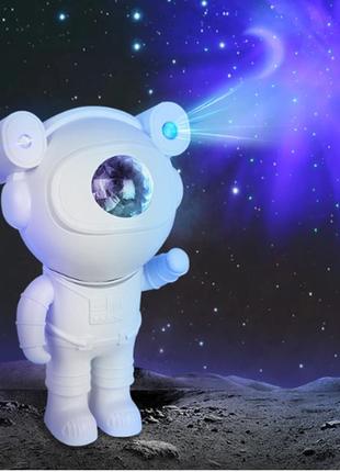 Лазерный проектор звездного неба астронавт с луной rgb с пультом и блютуз колонка +слот под sd карту - st-25373 фото