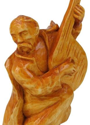 Авторская статуэтка ручной работы из дерева козак бандурист1 фото