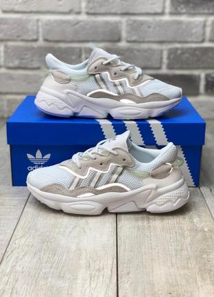 Красивая модель кроссовок adidas ozweego  рефлектив