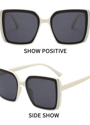 Крупные солнцезащитные квадратные очки в бежевых тонах и с черной линзой