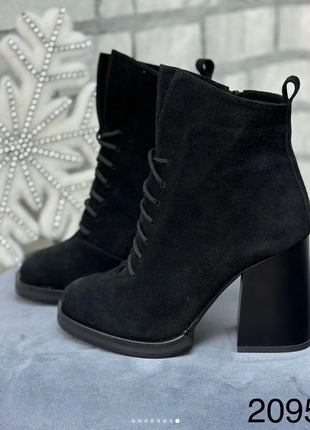 Женские зимние ботинки на каблуке8 фото