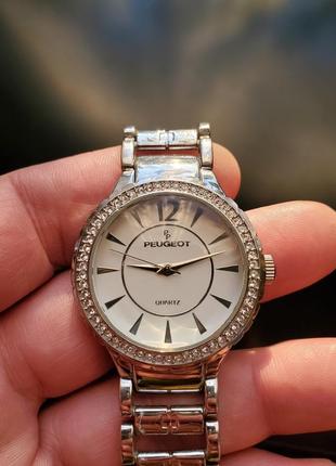 Pegeot 7049 кварцовий жіночій годинник з америки10 фото