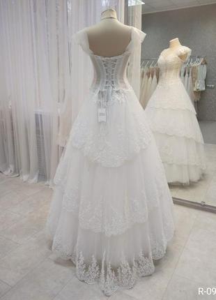 Весільна мереживна сукня білого кольору3 фото