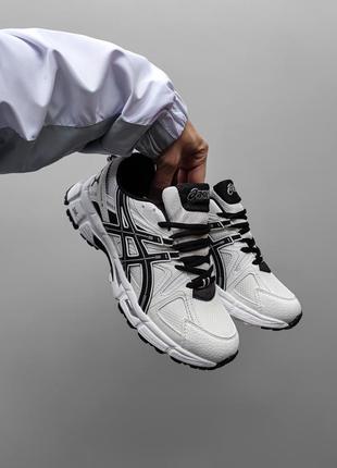 Reflekterande ASICS-spirallogotyp för synlighet
